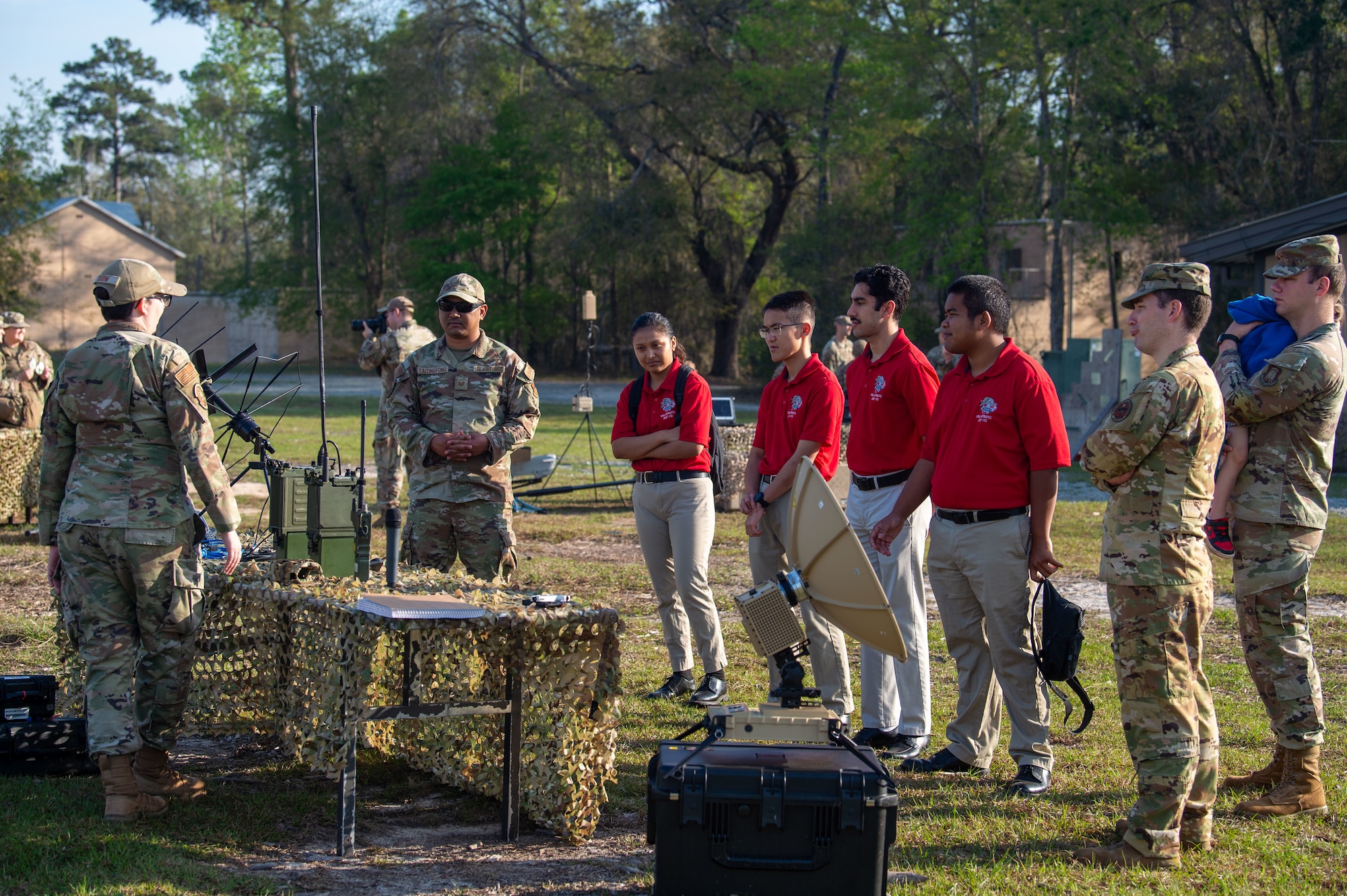 U.S. Air Force ROTC cadets from Valdosta State University Detachment 172 visit the 820th Base Defense Group at Moody Air Force Base, Georgia, March 15, 2024. As part of Women in Aviation Week, the 820 BDG gave a presentation to the ROTC cadets about field communication devices and how Defenders use them for base security. Team Moody’s annual WIA events aim to highlight aviation-related career fields and inspire local youth to consider futures in the Air Force. (U.S. Air Force photo by Airman 1st Class Iain Stanley)