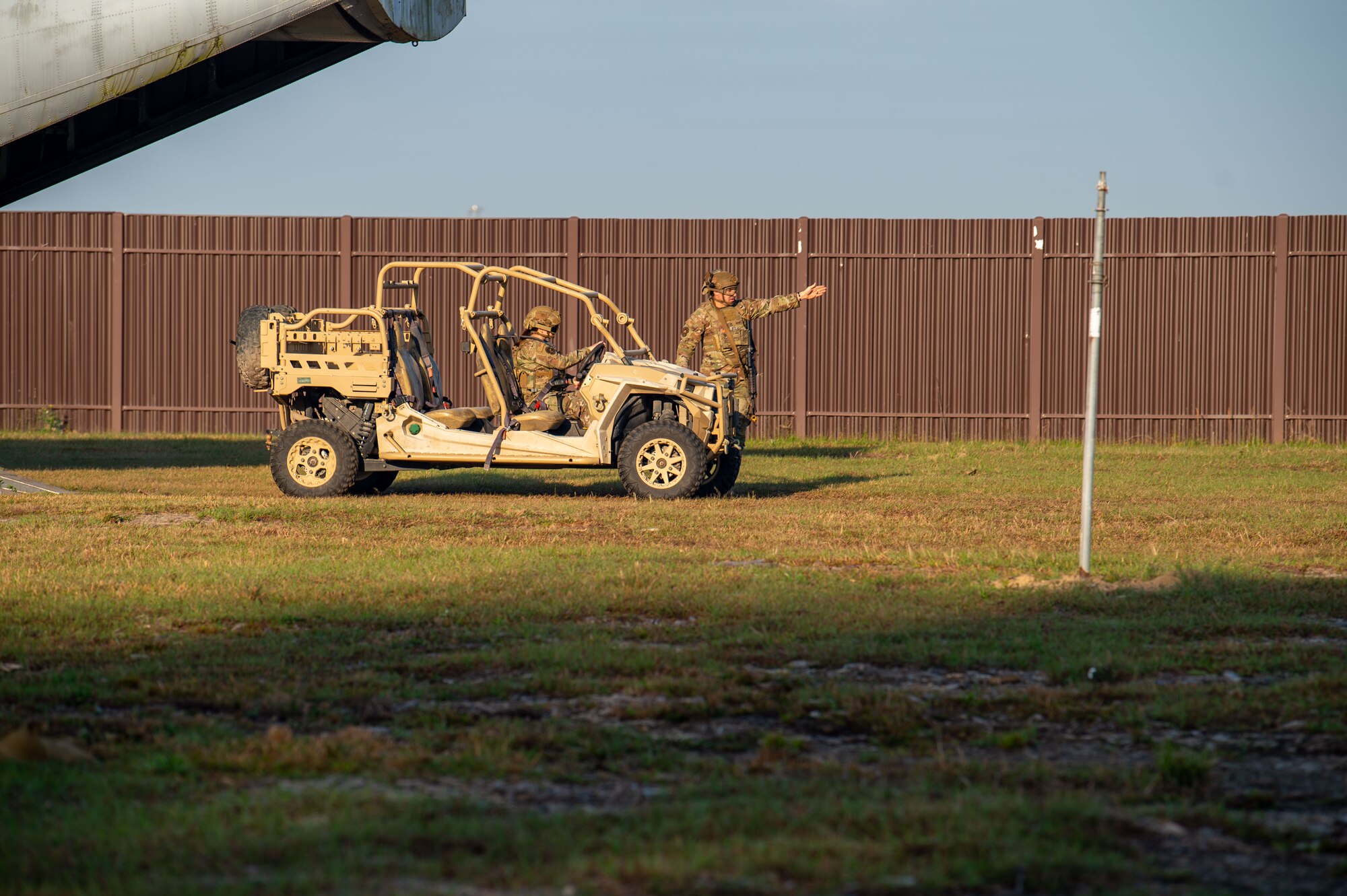 U.S. Air Force Airmen assigned to the 820th Base Defense Squadron operate an MRZR at Moody Air Force Base, Georgia, March 15, 2024. As part of Women in Aviation Week, the 820 BDG practiced infiltrating a simulated village after exiting a C-130 aircraft trainer. Team Moody’s annual WIA events aim to highlight aviation-related career fields and inspire local youth to consider futures in the Air Force. (U.S. Air Force photo by Airman 1st Class Iain Stanley)