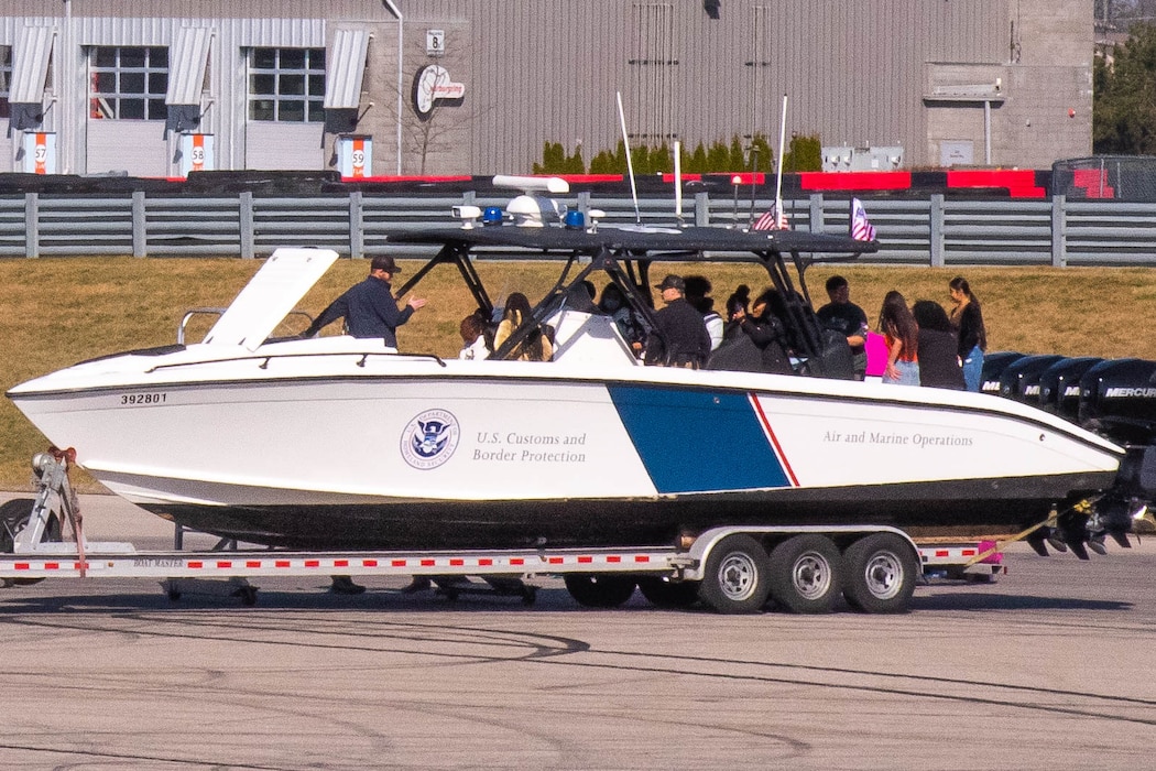 Group of kids on a USBP boat.