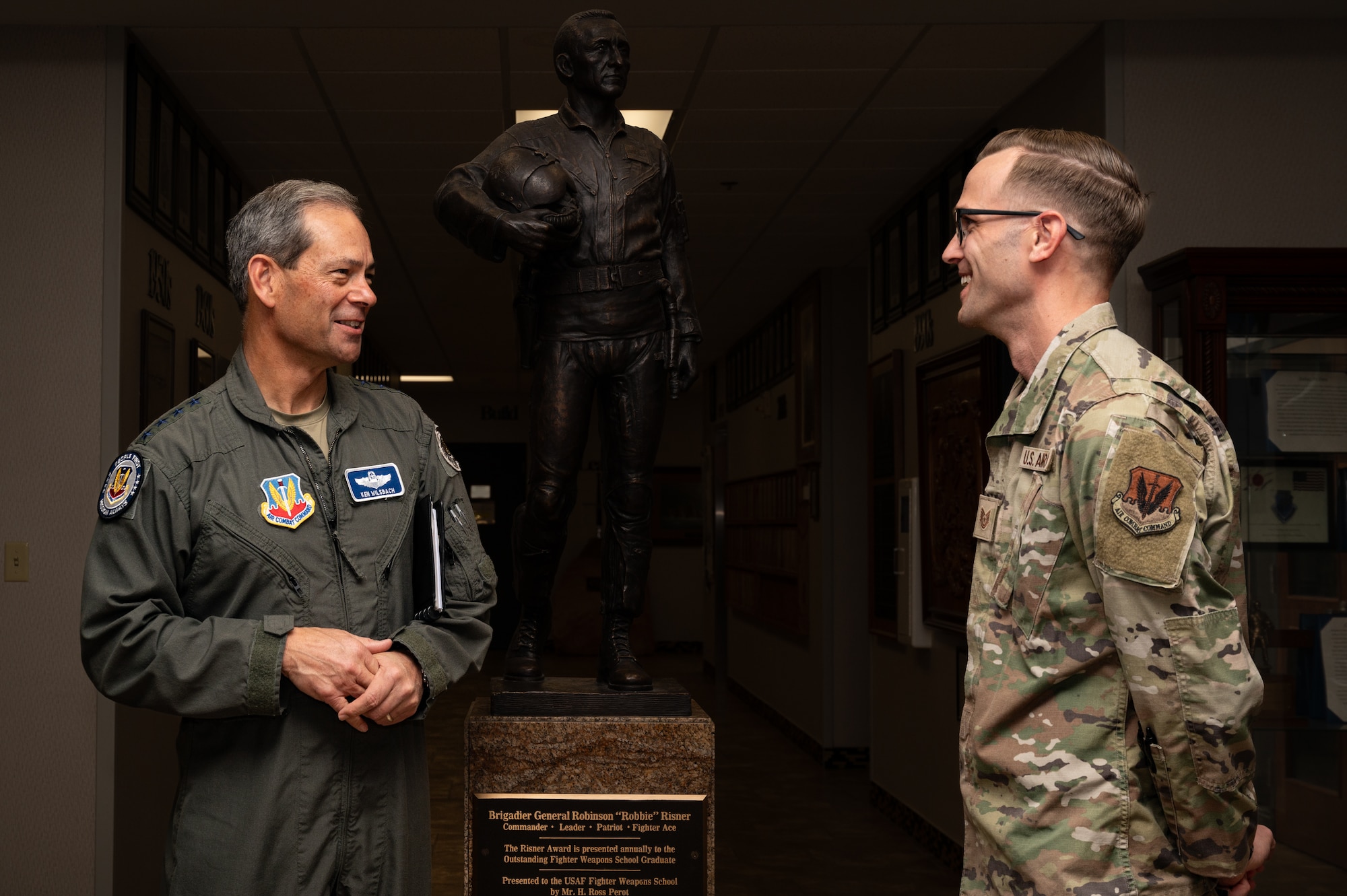 COMACC talking with Airmen