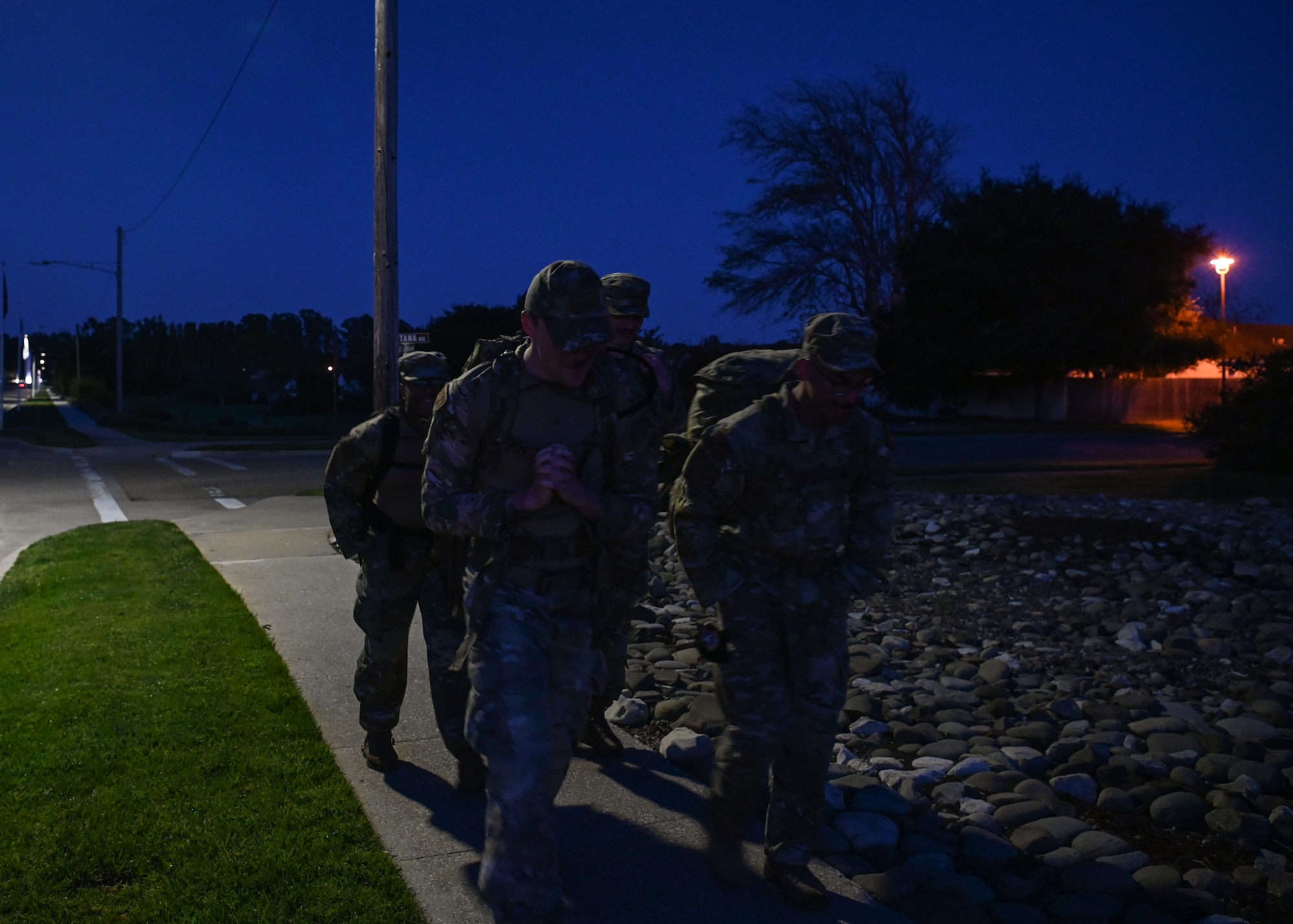 Servicemembers ruck in remembrance of the prisoners of war during the Bataan Memorial Death March at Vandenberg Space Force Base.