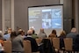 Attendees of the Sacramento District annual Business Opportunity Open House (BOOH) view a presentation regarding information about the District in Sacramento, California on March 5, 2024.