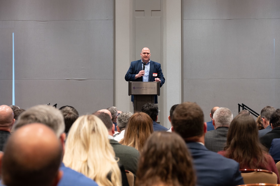 USACE Sacramento District Chief of Staff, Cameron Sessions speaks audience members at the annual Business Opportunity Open House (BOOH) regarding District information in Sacramento, California on March 5, 2024.