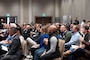 Attendees of the Sacramento District annual Business Opportunity Open House (BOOH) view a presentation regarding information about the District in Sacramento, California on March 5, 2024.