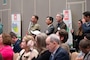 Attendees of the Sacramento District annual Business Opportunity Open House (BOOH) view a presentation regarding information about the District in Sacramento, California on March 5, 2024.