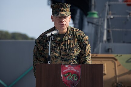 U.S. Marine Corps Brig. Gen. Trevor Hall, left, 3rd Marine Expeditionary Brigade commanding officer and deputy commander of Task Force 76/3, speaks during the Iron Fist 24 closing ceremony aboard the Osumi-class tank landing ship JS Kunisaki (LST-4003) in Okinawa, Japan, Mar. 17, 2024. The closing ceremony concluded training between the armed forces and awarded servicemembers for outstanding performance during Iron Fist 24. Iron Fist is an annual bilateral exercise designed to increase interoperability and strengthen the relationships between the U.S. Marine Corps, the U.S. Navy, the Japanese Ground Self-Defense Force, and the Japanese Maritime Self-Defense Force. (U.S. Marine Corps photo by Cpl. Juan K. Maldonado)