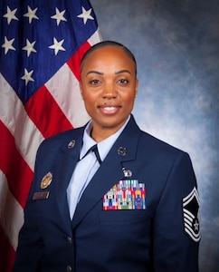 U.S. Air Force Senior Master Sgt. Rochell Brown, senior enlisted leader for the 11th Force Support Squadron at Joint Base Anacostia-Bolling, Washington, D.C., poses for her official photo at the Senior Noncommissioned Officer Academy at Maxwell Air Force Base in Montgomery, Alabama, on Dec. 1, 2023. Brown joined the Air Force on March 24, 2004