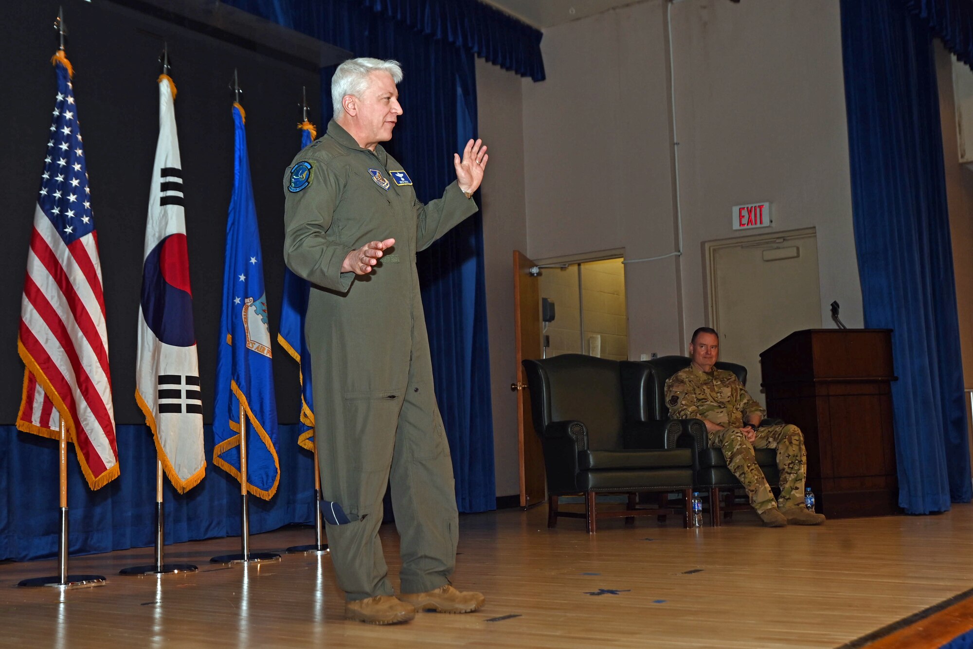 Maj. Gen. Erich Novak, Mobilization Assistant to the Commander, Pacific Air Forces, Joint Base Pearl Harbor-Hickam, Hawaii, left, delivers remarks during the retirement ceremony of Maj. Gen. Daniel Heires, Mobilization Assistant to the Commander, Air Component Command, United Nations Command; Commander, Air Component Command, Combined Forces Command; and Commander, 7th Air Force, right, at Osan Air Base, Republic of Korea, March 15, 2024.