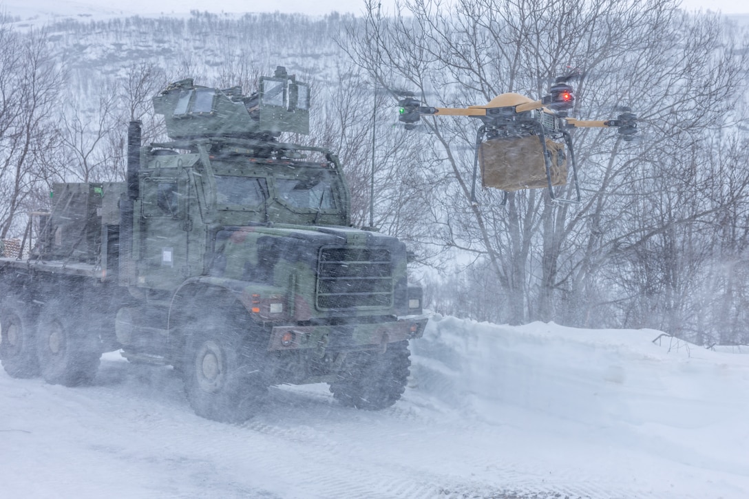 U.S. Marines with Combat Logistics Battalion 6, Combat Logistics Regiment 2, 2nd Marine Logistics Group, use a tactical resupply unmanned aircraft system to conduct a resupply during Exercise Nordic Response 24 in Alta, Norway, March 12, 2024. Exercise Nordic Response 24 is designed to enhance military capabilities and allied cooperation in high-intensity warfighting scenarios under challenging arctic conditions, while providing U.S. Marines unique opportunities to train alongside NATO allies and partners. (U.S. Marine Corps photo by Lance Cpl. Christian Salazar)