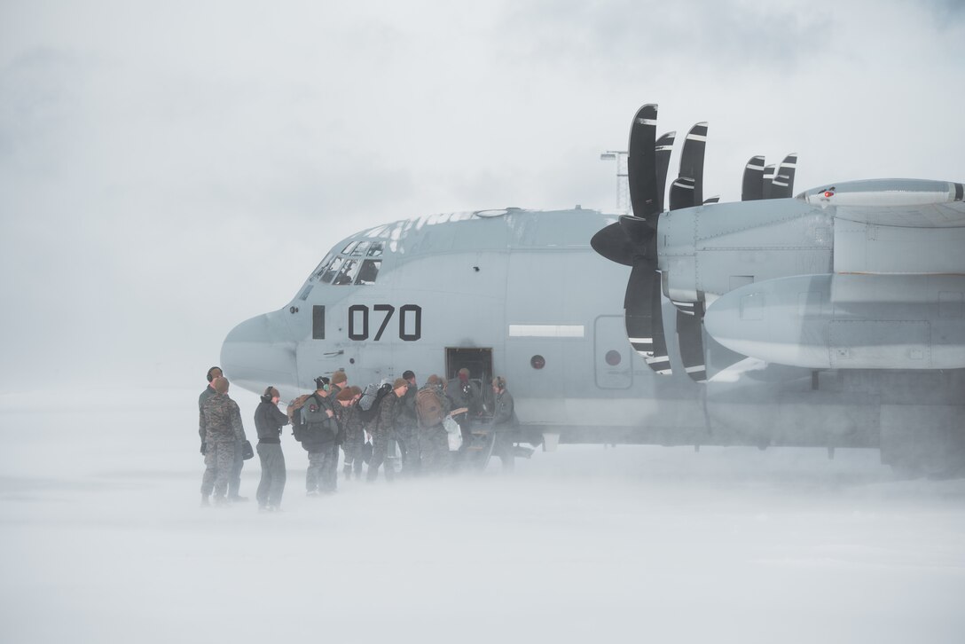 U.S. Marines with Marine Aerial Refueler Transport Squadron (VMGR) 252, 2nd Marine Aircraft Wing, embark a KC-130J Super Hercules as they self-redeploy to Marine Corps Air Station Cherry Point, North Carolina, after the conclusion of Exercise Nordic Response 24 at Andenes, Norway, March 16, 2024. Exercise Nordic Response is designed to enhance military capabilities and allied cooperation in high-intensity warfighting scenarios under challenging arctic conditions, while providing U.S. Marines unique opportunities to train alongside NATO allies and partners. (U.S. Marine Corps photo by 2nd Lt. Duncan Stoner)