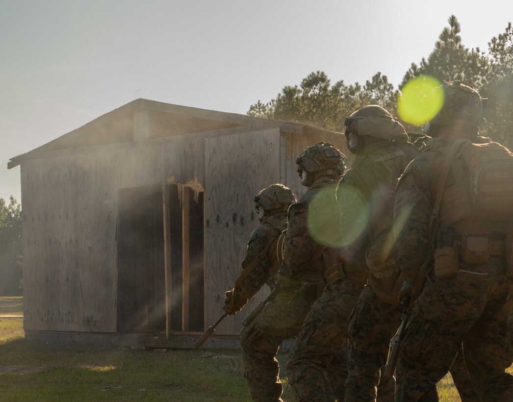 U.S. Marine Corps combat engineers and riflemen with Battalion Landing Team 1/8, 24th Marine Expeditionary Unit (MEU), breach a door during an urban breaching exercise on Camp Lejeune, North Carolina, March 12, 2024. The 24th MEU is a premier crisis response force capable of deploying and landing at a moment’s notice. The skilled 24th MEU Marines and Sailors who comprise the flexible sea-based Marine Air Ground Task Force are ready to answer the Nation’s call to crisis, no matter the clime or place. (U.S. Marine Corps photo by Cpl. Aydan Millette)