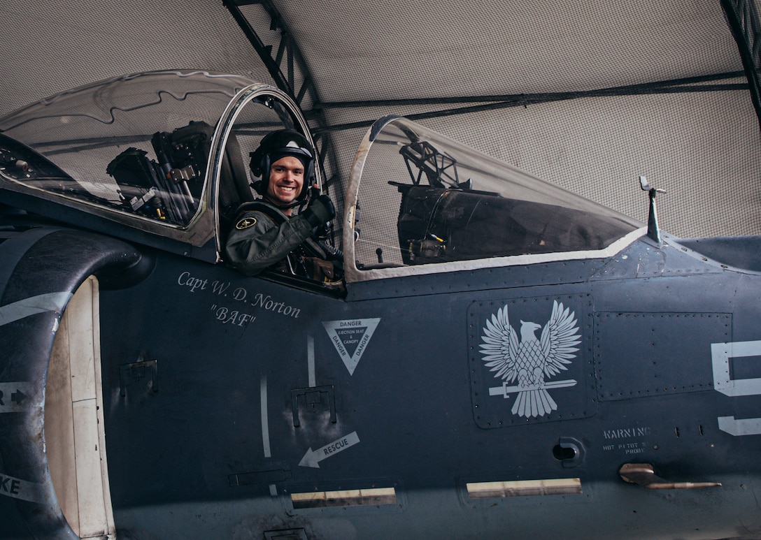 U.S. Marine Maj. Earl Ehrhart, an AV-8B pilot assigned to Marine Attack Squadron 231 Detachment, Marine Medium Tiltrotor Squadron 162 (Reinforced), 26th Marine Expeditionary Unit (Special Operations Capable) poses for a photo after flying from the USS Bataan (LHD-5) from deployment at Marine Corps Air Station Cherry Point, North Carolina, Mar. 16, 2024. Marines and Sailors assigned to the 26th MEU(SOC) returned home after completing an eight-month deployment embarked aboard the Bataan Amphibious Ready Group. During its deployment, the BAT ARG and 26th MEU(SOC) team participated in a wide array of exercises with NATO Allies and regional partners spanning across the Tri-Geographic Combatant Command to enhance interoperability, MAGTF readiness, and provide crisis response options. (U.S. Marine Corps Photo by Cpl. Aziza Kamuhanda)