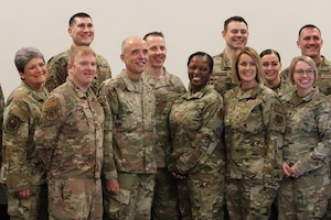 Image of Airmen posing for a photo.
