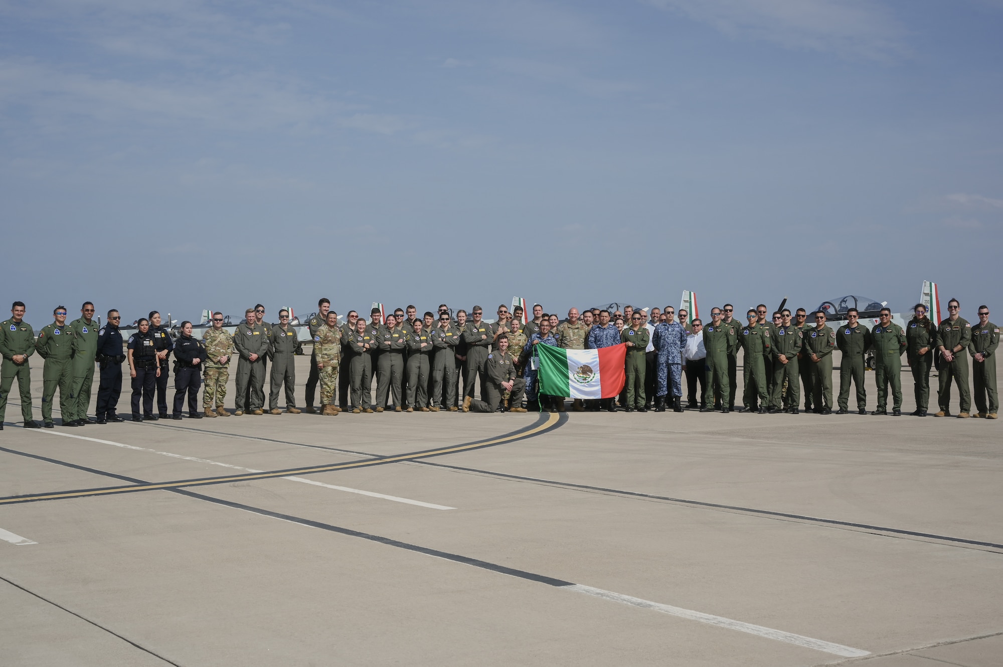 The Mexican Air Force and U.S. Air Force Airmen pose for a group photo at Laughlin Air Force Base, Texas, March 6, 2024.