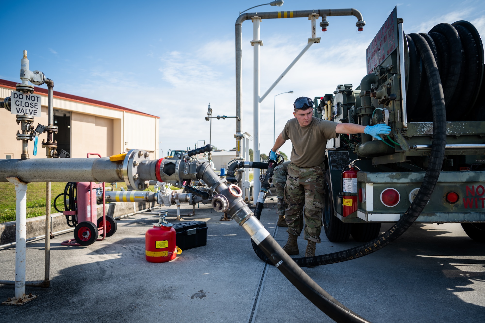 The test certifies the 6th LRS POL flight’s capability to perform hot pit refueling with their R-12 refueling truck. (U.S. Air Force photo by Senior Airman Zachary Foster)