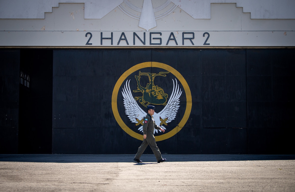 A military service member with the Comando Aéreo Central (CACEN) walks the flight line on CACEN “La Aurora” in Guatemala City, Guatemala, Feb. 26, 2024.