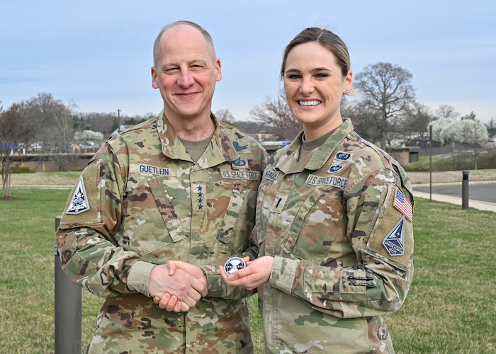 Vice Chief of Space Operations Gen. Michael Guetlein poses with 1st Lt. Olivia Krause during the Guardian Field Forum at Joint Base Andrews, Md., March 15, 2024. The forum is a week-long event that brings together junior Guardians and senior Space Force leaders to collaborate on initiatives to improve the Space Force. (U.S. Air Force photo by Eric Dietrich)