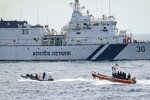 A crew aboard a long-range intercept boat (LRI) from U.S. Coast Guard Cutter Bertholf (WMSL 750) conducts pursuit training with a small boat from the Indian Coast Guard Vessel, Vishwast, as the ship transits the Andaman Sea during exercise ‘Sea Defender,’ March 9, 2024. The exercise allowed members from both services to see how members operate their respective small boats. (U.S. Coast Guard photo by Petty Officer Steve Strohmaier)