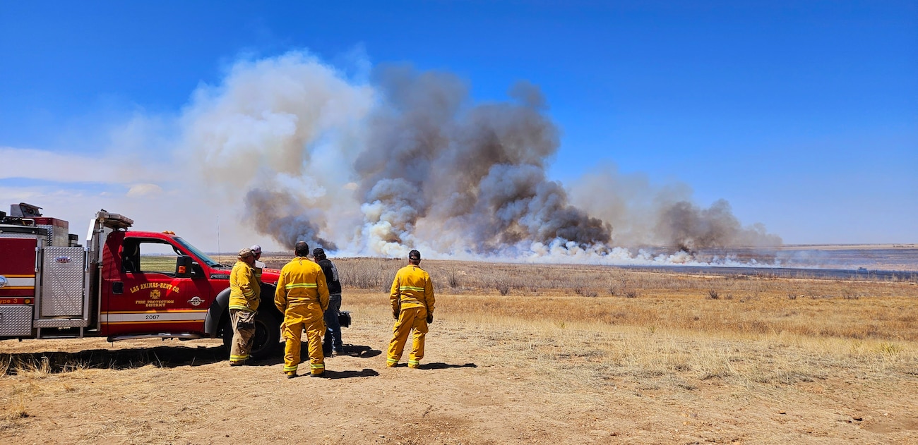Firefighters from the Las Animas-Bent County Colorado Fire Protection District watch the 2023 Gageby Creek Fire, April 19, 2023, near John Martin Reservoir. Photo by Holly Garnett, Natural Resources Specialist at John Martin Reservoir.