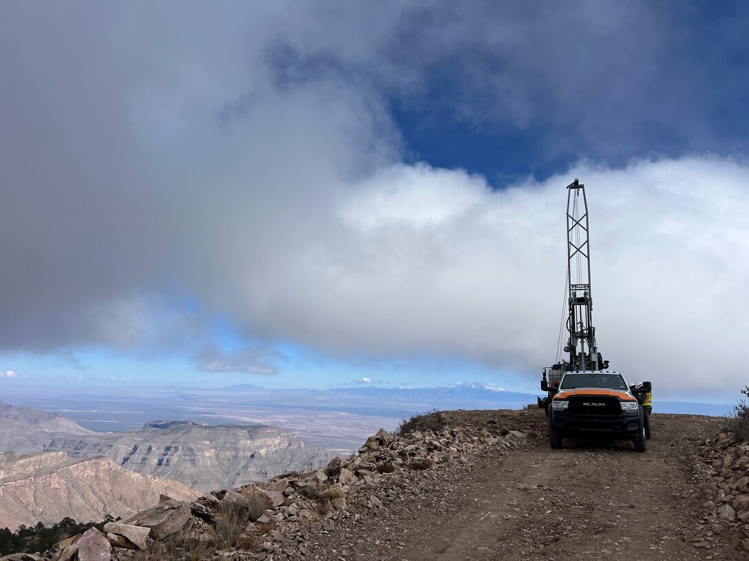 The contract drillers and geotechnical drill rig on Salinas Peak (elevation 9,000 feet), near Truth or Consequences, N.M., Nov. 11, 2023. Photo taken from Salinas Peak Road looking north at the rig in the clouds.