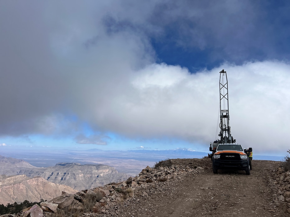 The contract drillers and geotechnical drill rig on Salinas Peak (elevation 9,000 feet), near Truth or Consequences, N.M., Nov. 11, 2023. Photo taken from Salinas Peak Road looking north at the rig in the clouds. Photo by Chris Carroll, geologist, Geotechnical Engineering Section.