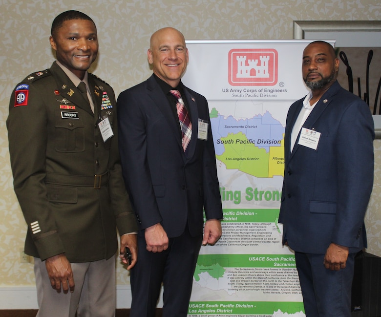 From left to right, U.S. Army Corps of Engineer Los Angeles District Deputy Commander Lt. Col. Stephen Brooks; Eric Ravelli, the LA District’s deputy of the Office of Small Business Programs; and Sacramento District Procurement Analyst Vernon Simpkins pose for a picture after welcoming participants and partners to the spring Business Opportunities Open House, or BOOH, March 13 at the Midtown Hilton Garden Inn in Phoenix. During the BOOH, more than 375 business owners met with the district’s division chiefs, and program and project managers.