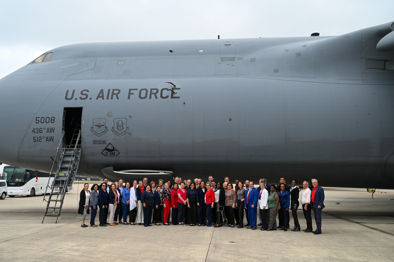 Masters Leadership Program of Greater San Antonio members pose for a group photo on the flight line on Joint Base San Antonio-Lackland, Texas Mar. 14, 2024.