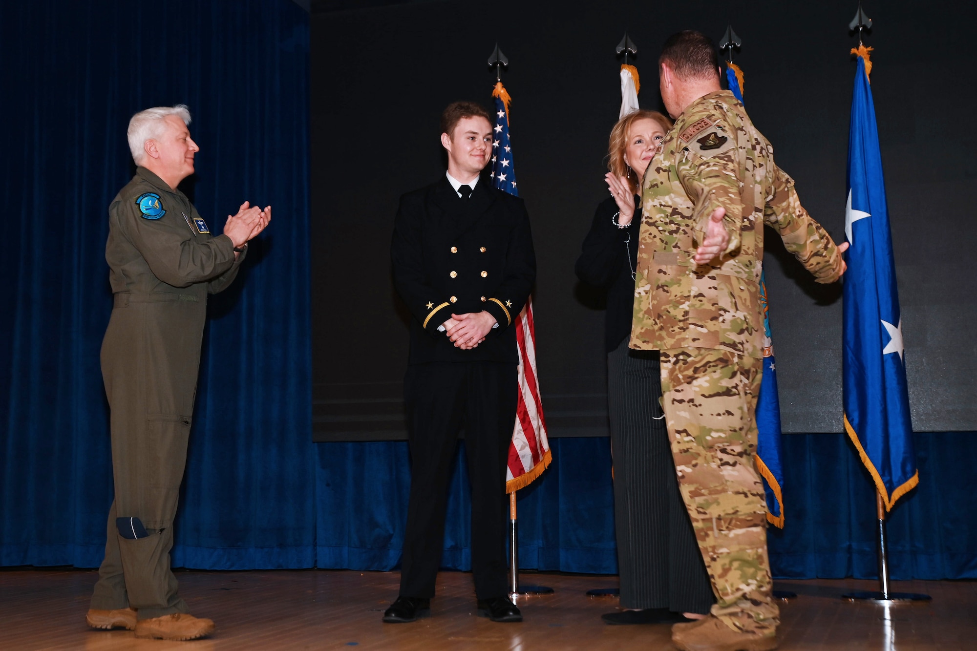 Maj. Gen. Daniel Heires, Mobilization Assistant to the Commander, Air Component Command, United Nations Command; Commander, Air Component Command, Combined Forces Command; and Commander, 7th Air Force, right, celebrates with his with wife, Beth Heires, and son, Cole Heires, during General Heires’ retirement ceremony at Osan Air Base, Republic of Korea, March 15, 2024.