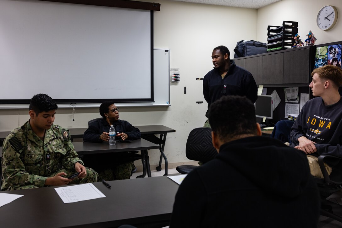 U.S. Navy Aviation Support Equipment Technician Second Class Patrice Brooks with Aircraft Intermediate Maintenance Department (AIMD), Marine Corps Air Station (MCAS) Iwakuni, attends a meeting with other members of the Coalition of Sailors Against Destructive Decisions (CSADD) at MCAS Iwakuni, Japan, Feb. 22, 2024. As the command career counselor for AIMD Iwakuni and president of CSADD, Brooks holds a responsibility to ensure all Sailors under her guidance are well prepared to advance their careers and be valuable contributors to the community. (U.S. Marine Corps photo by Cpl. Isaac Orozco)