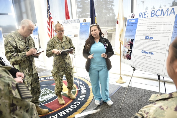 A UCC change for the better…Inventive ingenuity was on display for staff, patient and visitor at Navy Medicine Readiness and Training Command Bremerton. During the command-wide Continuous Process Improvement Fair held March 11-14, 2024, multiple departments came together to showcase their ideas to enhance the impact on quality of patient care and patient safety, as well as mission readiness including the Urgent Care Clinic exhibited ‘BCMA’ [bar code medication administration] by project lead RN Carmen Arehart (pictured), Lt. Agustina Aure and team members HM2 Jessica Casillas and HN Demetria Wilder (official Navy photo by Douglas H Stutz, NHB/NMRTC Bremerton public affairs officer).