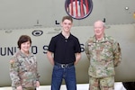 Isaac Bell, a Pennsylvania Army National Guard recruit who enlisted through the 09W program, is honored during an enlistment and swearing-in ceremony at Muir Army Heliport at Fort Indiantown Gap, Pennsylvania, March 15, 2024. The program, known as “streets to seats” or “high school to flight school,” provides a path to flight school after basic training.