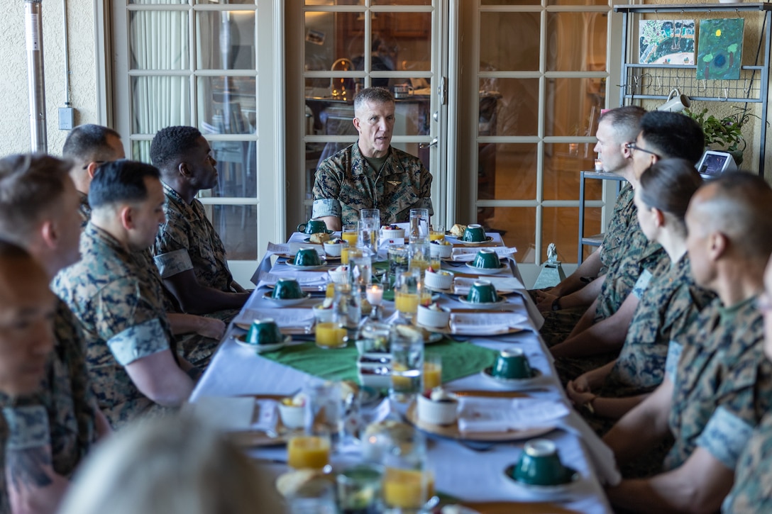 U.S. Marine Corps Brig. Gen. Jason Woodworth, center, the commanding general for Marine Corps Installations West, Marine Corps Base Camp Pendleton delivers remarks during a breakfast at the Commanding General’s Quarters at MCB Camp Pendleton, California, March 14, 2024. Woodworth and his wife, Renee Woodworth, hosted the breakfast to recognize and celebrate the newly-awarded MCI-West Marine of the Year, Marine of the Quarter and Noncommissioned Officer of the Quarter. (U.S. Marine Corps photo by Lance Cpl. Mhecaela J. Watts)