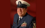A portrait of Master Chief John E. “Jack” Downey, who served in the Coast Guard for over 40 years, including five officer-in-charge multi-mission ashore assignments and two officer-in-charge afloat assignments.