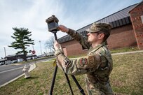 U.S. Air Force Master Sgt. James Graff, 305th Operations Support Squadron airfield weather service noncommissioned officer in charge, performs a function check on the Advanced Micro Weather Station at Joint Base McGuire-Dix-Lakehurst, N.J., March 13, 2024. Weather observations are critical to military operations, reporting current states of the atmosphere from the surface to varying flight levels. (U.S. Air Force photo by Jewaun Victor)