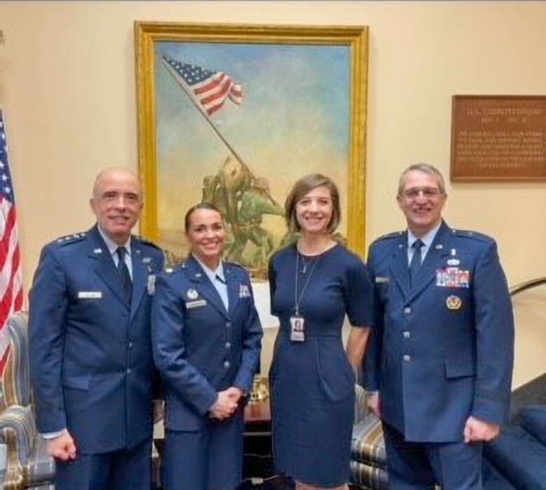 U.S. Air Force Lt. Col. Danielle Merritt, currently serving as the 9th Operational Medical Readiness Squadron commander, poses for a picture with Lt. Gen. Robert I. Miller, Headquarters U.S. Air Force surgeon general (left), and Maj. Gen. John J. Bartrum, Headquarters U.S. Air Force mobilization assistant to the surgeon general, ahead of testifying before the House Appropriations Subcommittee on Defense in Washington, D.C., 2022.