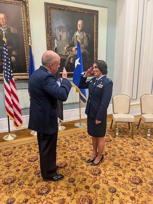 U.S. Air Force Lt. Gen. Robert I. Miller, Headquarters U.S. Air Force surgeon general, promotes Lt. Col. Danielle Merritt, currently serving as the 9th Operational Medical Readiness Squadron commander, in Washington, D.C., 2023