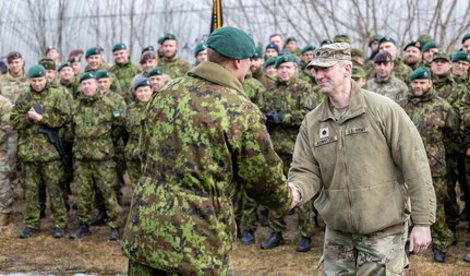 LTC Michael Kowalski, Commander of the 244th Digital Liaison Detachment (DLD) and MG Veiko-Vello Palm, Commander of the 1st Estonia Division acknowledge a job well done at the closing ceremony of Warfighter 24.3 in Tallinn, Estonia. The 244th DLD was deployed forward to multiple locations in Estonia in March 2024 in support of the NATO multi-national named exercise 'Austere Challenge 2024'. (Credit MAJ Argo Savi, ESTDIV)