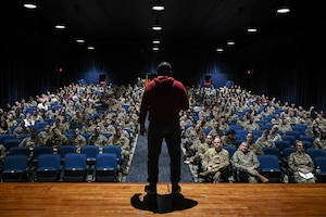 A man speaks to a crowd.