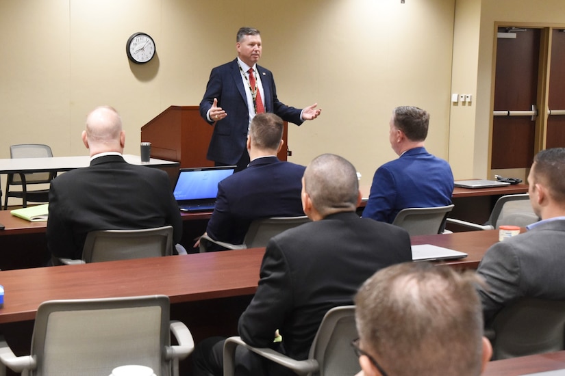 Robert W. Matthews, chief of the Army CID Strategic Initiatives Group, updates members of the 200th Military Police Command.