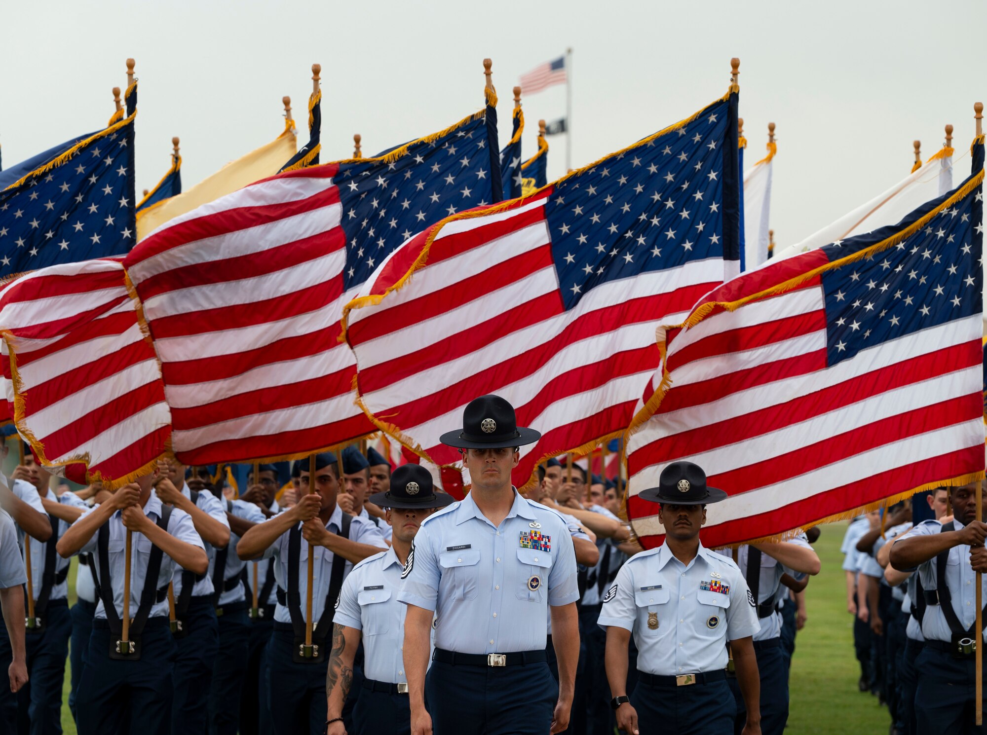 Airmen stand at attention