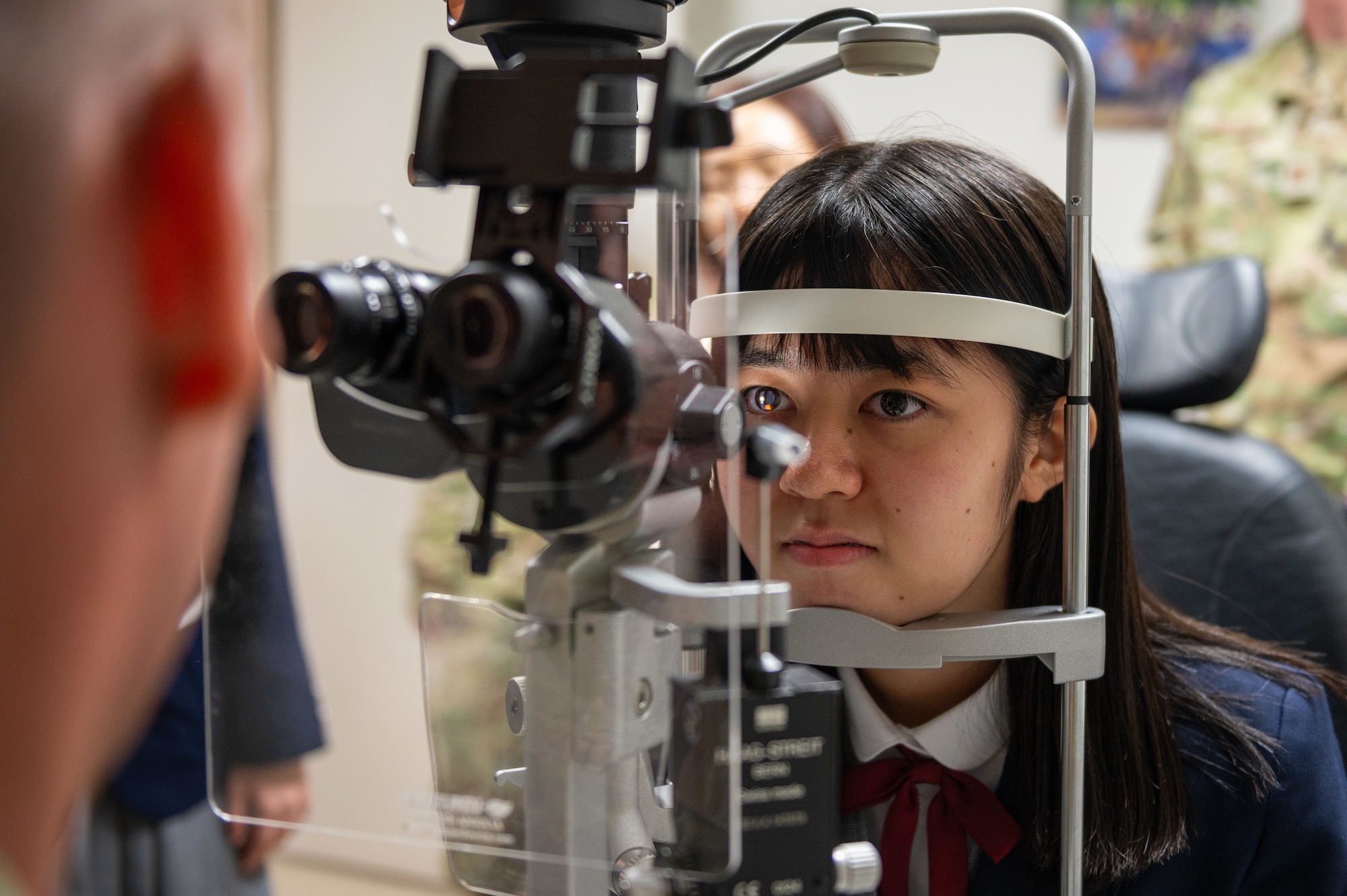 An Okinawan student receives an eye exam