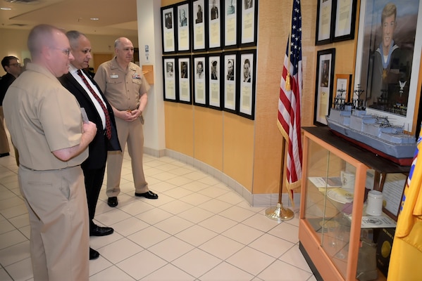 Remembering those who gave their all…When Secretary of the Navy Carlos Del Toro recently visited Navy Medicine Readiness Training Unit Everett’s clinic, he was drawn to the clinic’s namesake, Hospital Corpsman David R. Ray, reverently remembered on the quarterdeck. The Congressional Medal of Honor recipient (posthumously) was killed in action March 19, 1969, for his actions during the Vietnam War at Phu Loc 6 near An Hoa in Quang Nam Province, Vietnam (Official Navy photo by Douglas H Stutz, NHB/NMRTC Bremerton public affairs officer).