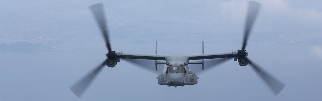 A U.S. Marine Corps MV-22B Osprey, with Marine Medium Tiltrotor Squadron 265, Marine Aircraft Group 36, 1st Marine Aircraft Wing, conducts maneuvers over Yokota Air Force Base, Honshu, Japan, Aug. 31, 2014. The flight was to demonstrate the capabilities of the MV-22B in humanitarian assistance and disaster relief capabilities to the Japanese community and improve the relationship between the Marine Corps and Japan. (U.S. Marine Corps photo by MCIPAC Combat Camera Lance Cpl. Sergio RamirezRomero/Released)