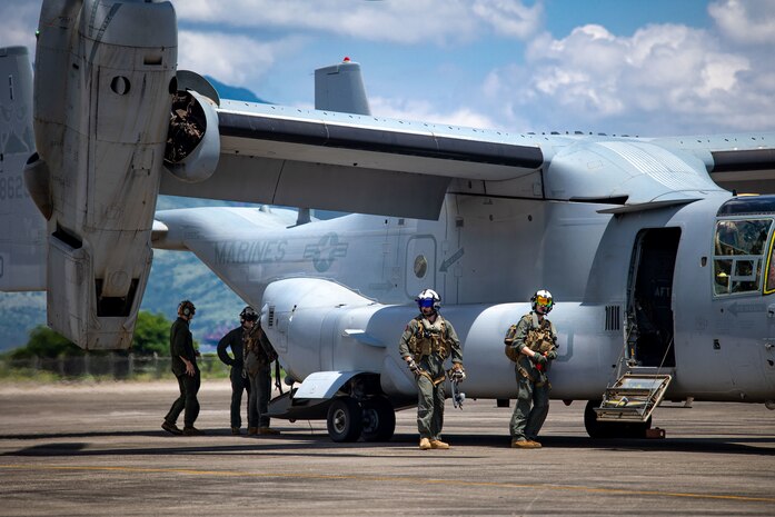 U.S. Marines with Marine Medium Tilt-Rotor Squadron (VMM) 265 perform pre-flight procedures on an MV-22B Osprey during Marine Aviation Support Activities 22-2, July 18, 2022, Subic Bay, Philippines.