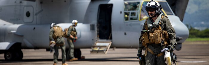 U.S. Marine Corps Capt. Logan Vaughan, a MV-22B Osprey pilot with Marine Medium Tilt-Rotor Squadron (VMM) 265, walks the flight line during Marine Aviation Support Activities 22-2, July 18, 2022, Subic Bay, Philippines.
