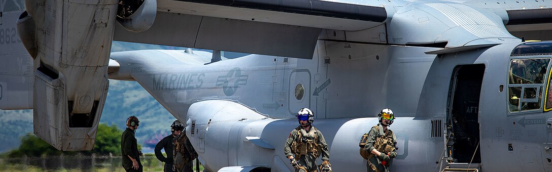 U.S. Marines with Marine Medium Tilt-Rotor Squadron (VMM) 265 perform pre-flight procedures on an MV-22B Osprey during Marine Aviation Support Activities 22-2, July 18, 2022, Subic Bay, Philippines. MASA 22-2 is a bilateral exercise between the Armed Forces of Philippines and the U.S. Marine Corps, aimed at increasing interoperability and improving aviation-related capabilities in support of U.S.-Philippine mutual defense. (U.S. Marine Corps photo by Cpl. Gerardo W. Cano)