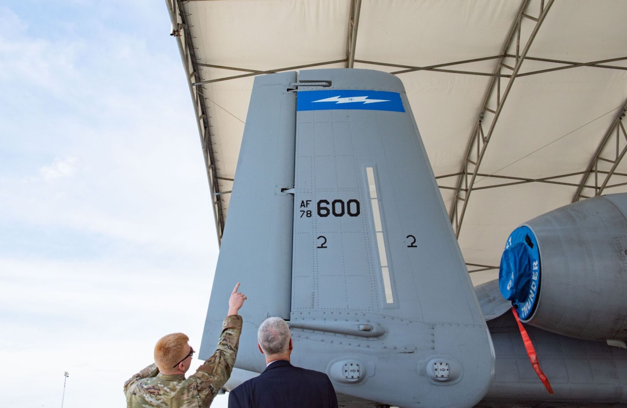 Chief Master Sgt. of the Air Force (ret.) Gerald R. Murray is shown the tail of an A-10C Thunderbolt II at Moody Air Force Base, Georgia, March 15, 2023. Murray toured Moody and received in depth showcases of base capabilities and airmen astuteness. (U.S. Air Force photo by Airman 1st Class Sir Wyrick)
