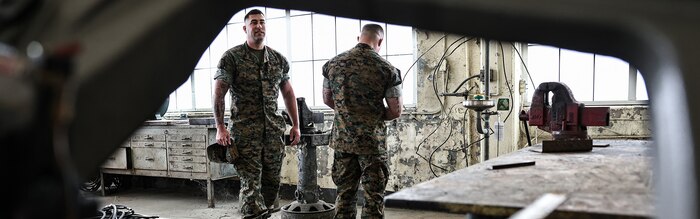 U.S. Marine Corps Gunnery Sgt. Derek M. Wolford, battery gunnery sergeant with India Battery, 3rd Battalion, 14th Marine Regiment, left, and Gunnery Sgt. Jeremy J. Toteno, battery gunnery sergeant with Golf Battery, 3rd Battalion, 14th Marine Regiment, conduct a mock inspection of hazard identification during the Ground Safety for Marines (GSM) Course on Marine Corps Base Camp Lejeune, North Carolina, April 24, 2023.