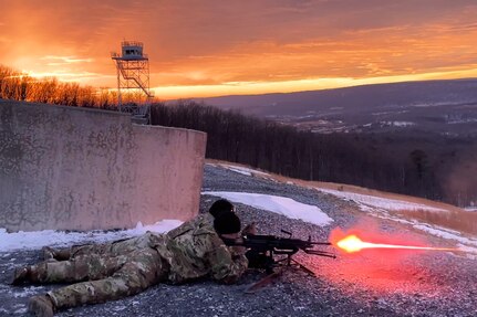 U.S. Soldiers with the Pennsylvania National Guard fire M249 light machine guns during the crew served weapons course at Fort Indiantown Gap, Pennsylvania, Jan. 31, 2024. The crew served weapons course is offered through the Pennsylvania National Guard's Individual Training Branch. 36 students from units across the state honed in their marksmanship skills by training on the M249 light machine gun, M240B machine gun, Mark 19 40 mm grenade machine gun and M2A1 machine gun in order to become subject matter experts on those weapon systems. (U.S. Army National Guard photo by Sgt. 1st Class Rani Doucette)