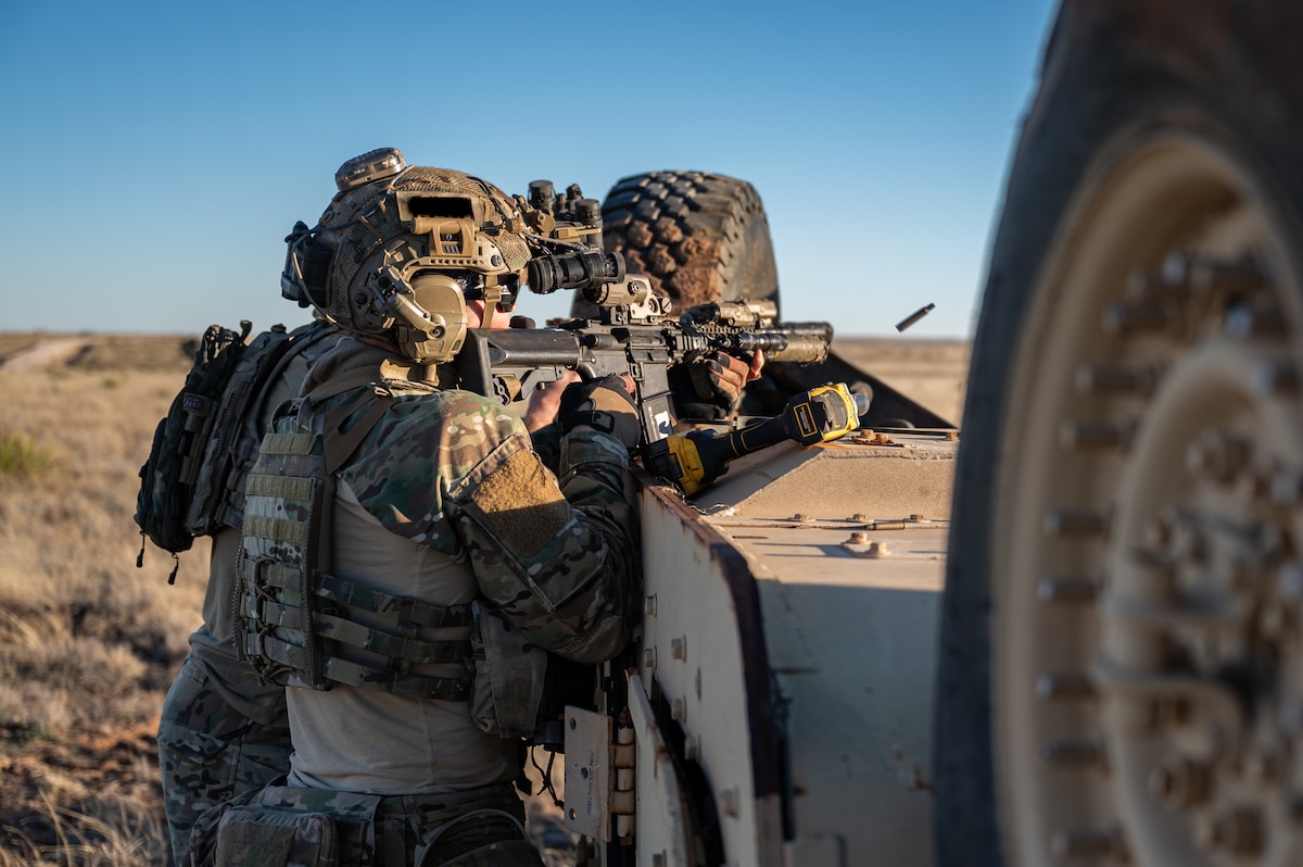 A Special Tactics Airman assigned to the 24th Special Operations Wing returns fire during exercise Emerald Warrior 24 at Cannon Air Force Base, New Mexico, March 2, 2024. Special Tactics Airmen are continuously adapting, and training in order to ensure mission success for the joint force. (U.S. Air Force photo by Senior Airman Stephen Pulter)